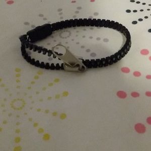 Free bracelet with any purchase over $25